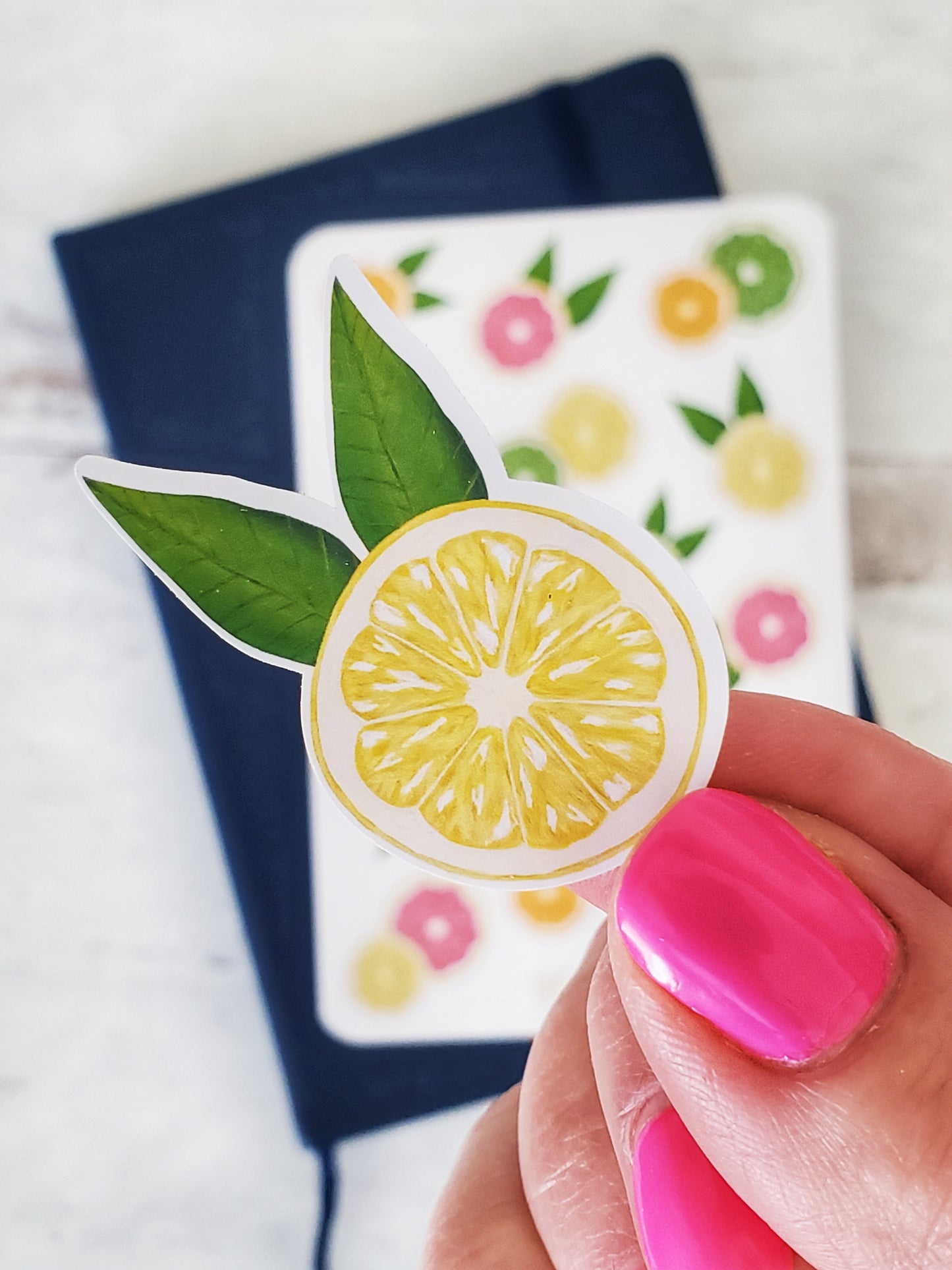 A close up of the lemon sticker. The illustration style is highly detailed, bold and semi realistic.