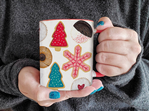 hands holding Christmas cookie mug