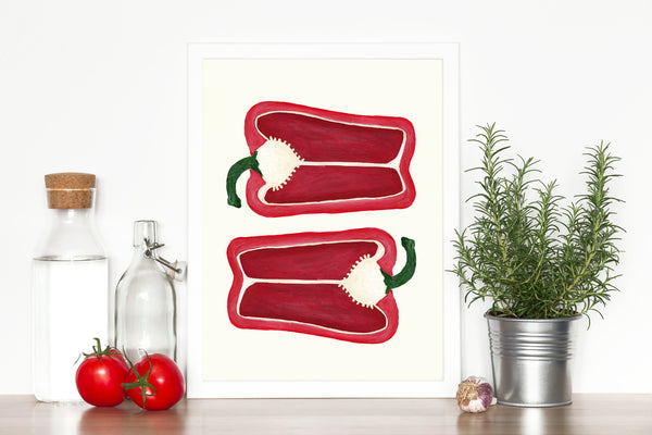 red bell pepper art print styled with kitchen items