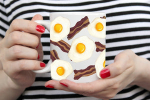 white ceramic mug wrap around pattern is hand painted bacon and eggs illustrations 