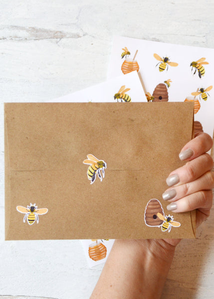 honey bee stickers on a kraft mailing envelope
