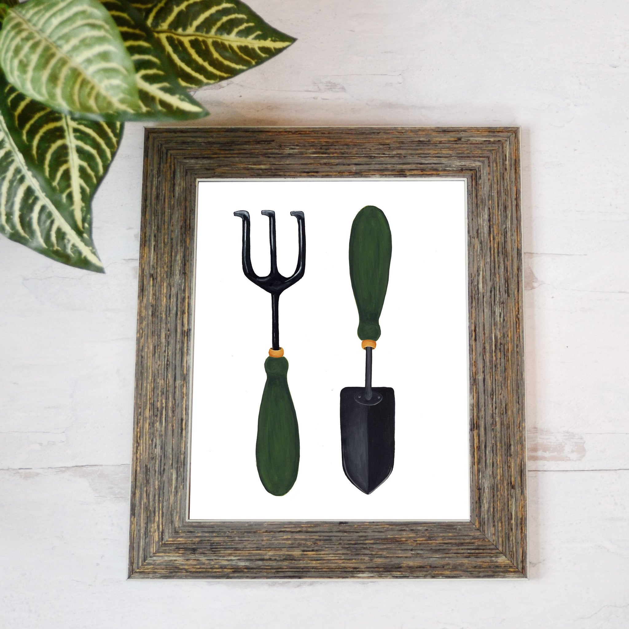 art print of hand painted gardening trowel and rake with green handles