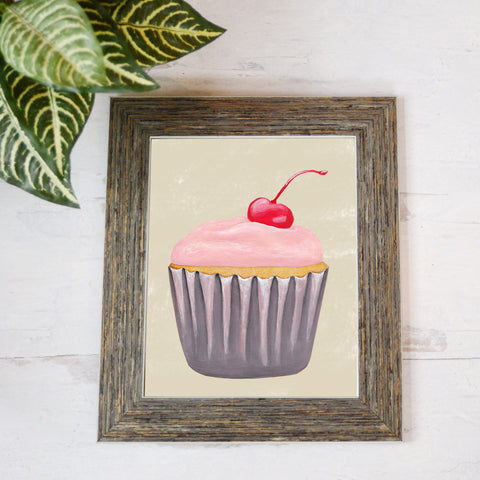 Art print of a pink frosted cupcake with cherry on top in purple wrapper