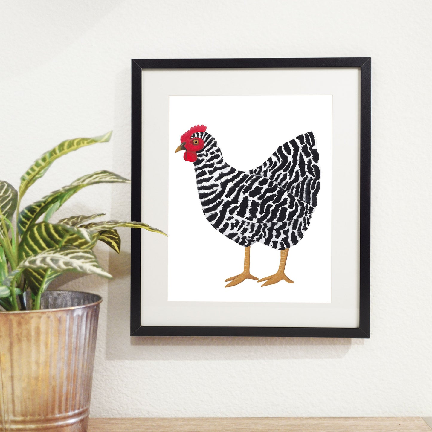 black and white chicken art print in black frame