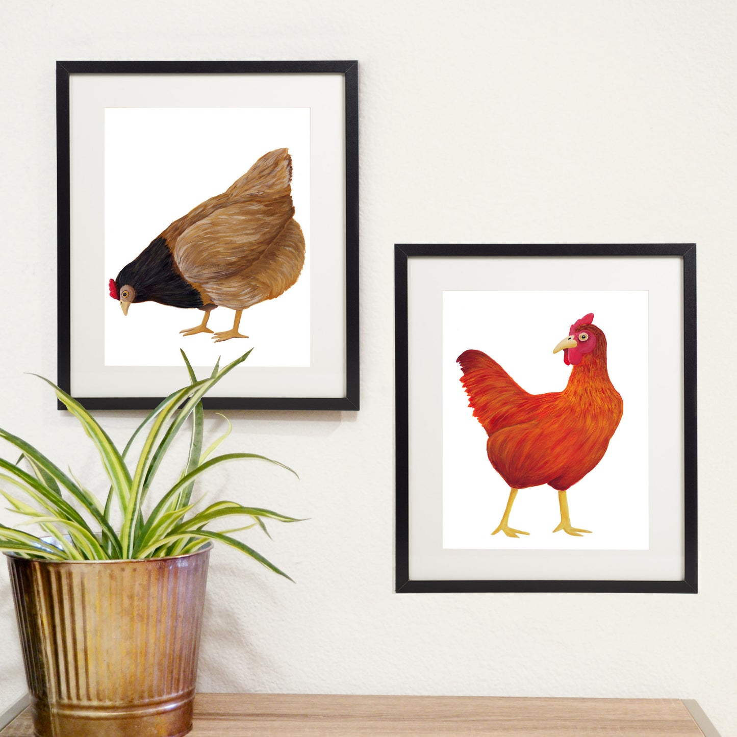 brown chicken print with red chicken print in black frames